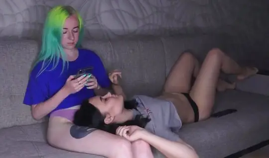 Lesbians on the couch polish each others juicy holes with tender tongu...