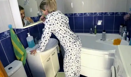 The guy lowered his pajamas at home in the bathroom with the girl and ...