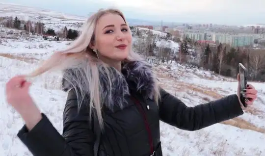 Russian girl in winter in nature sucks off her lover's plump penis...