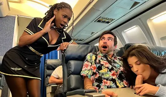 Russian chick and black woman suck the mans penis on the plane